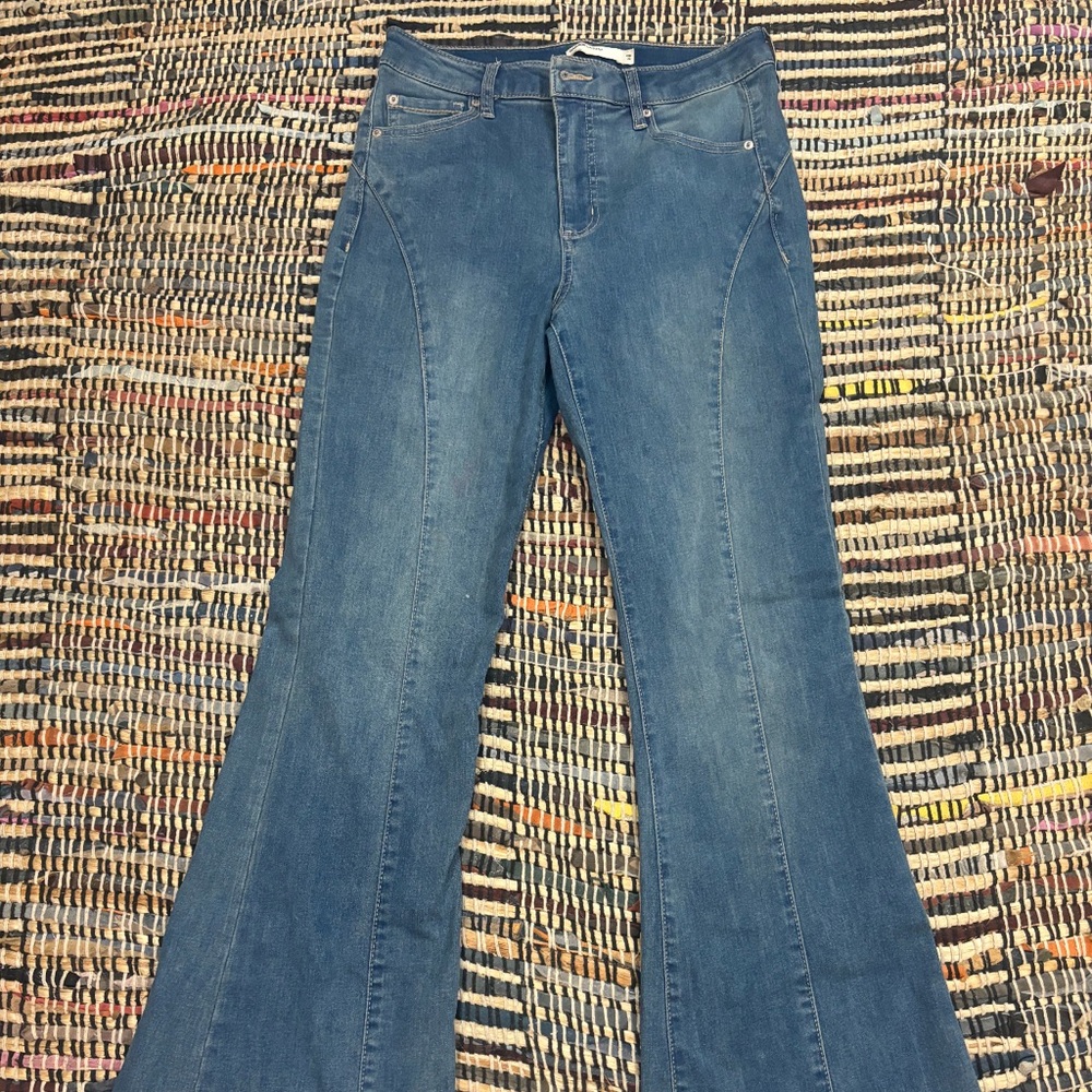 Dark washed Garage denim wide flare jeans||garage